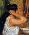 femme se peignant les cheveux Pierre Auguste Renoir